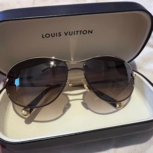 Authentic Louis Vuitton sunglasses with case, never worn